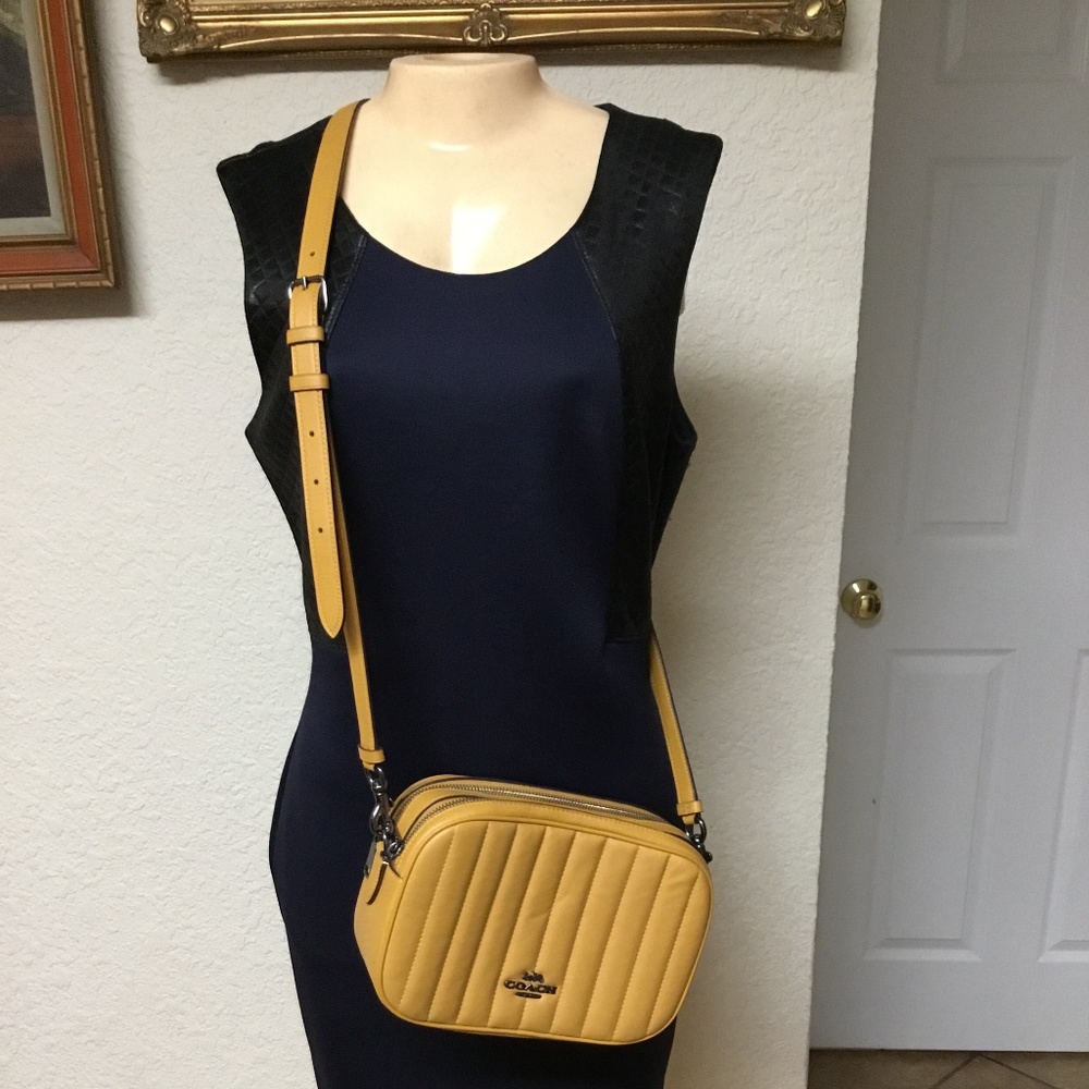 Mustard yellow cross body coach bag